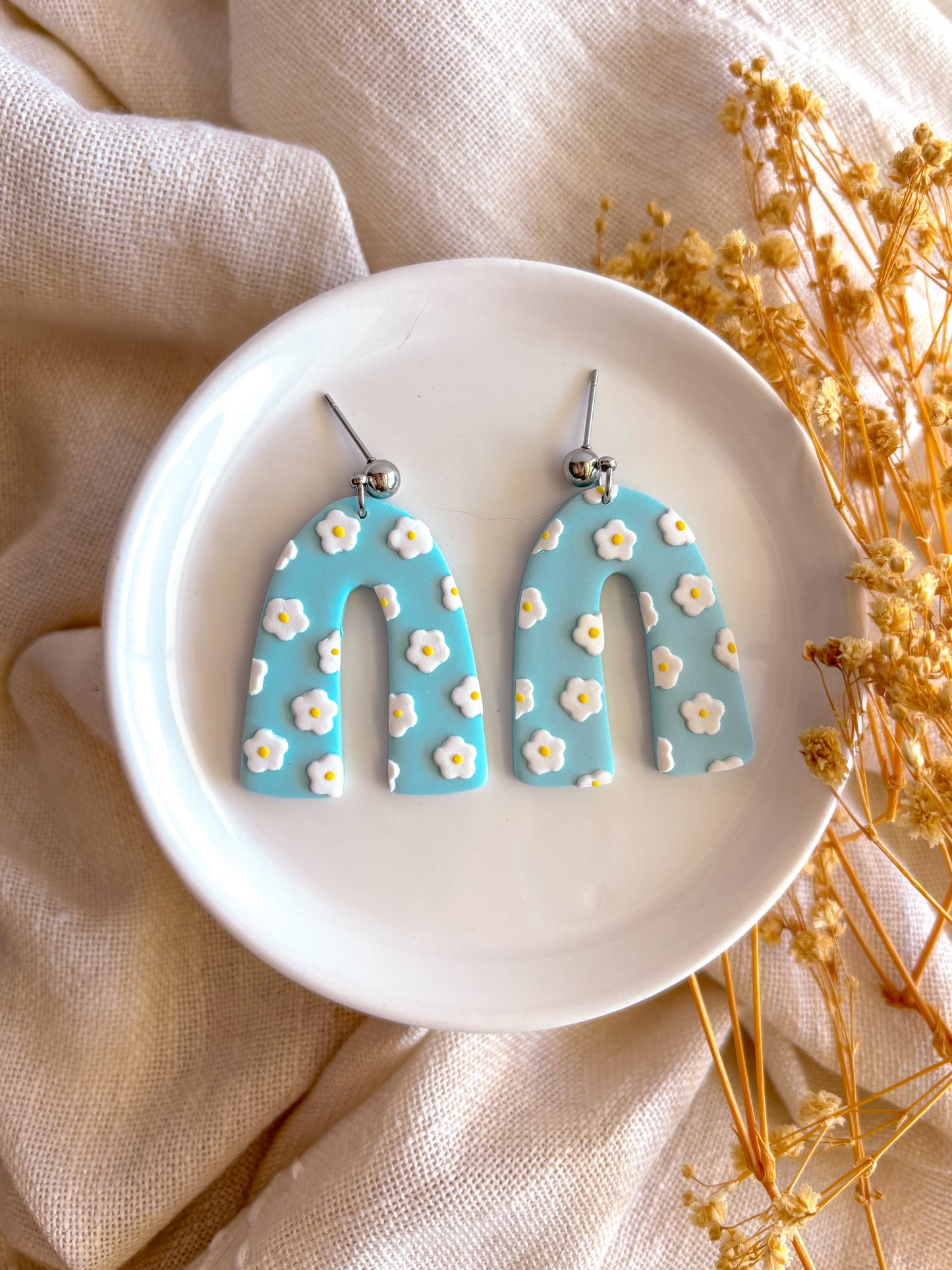 Daisy Blue Arch Dangles