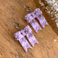 Pearl and Purple Bow Dangles
